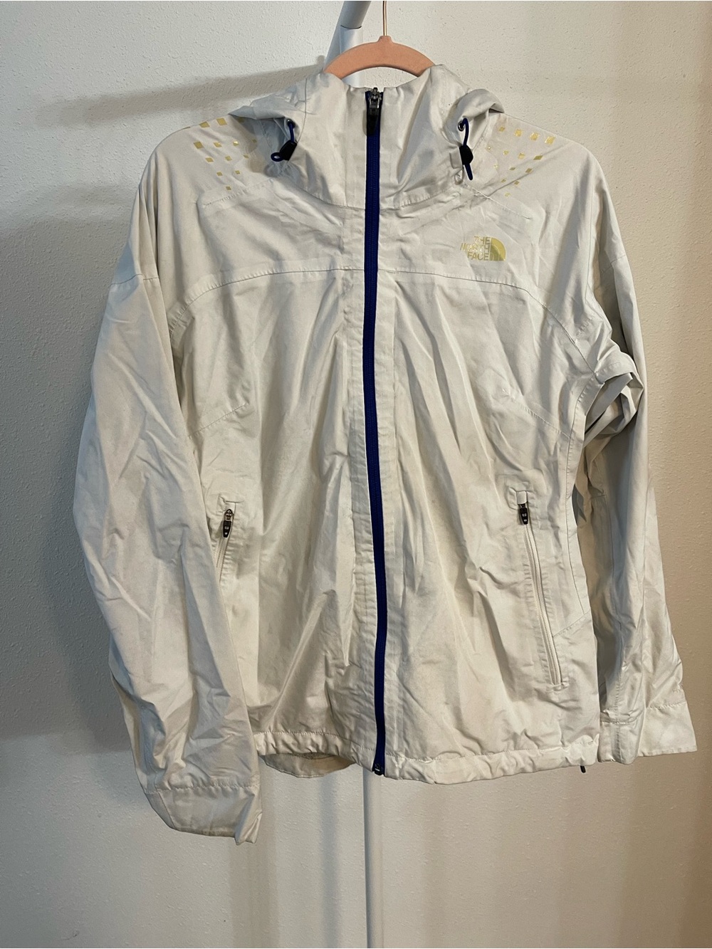 The North Face women’s large  White Hooded Rain Jacket with Navy Zip